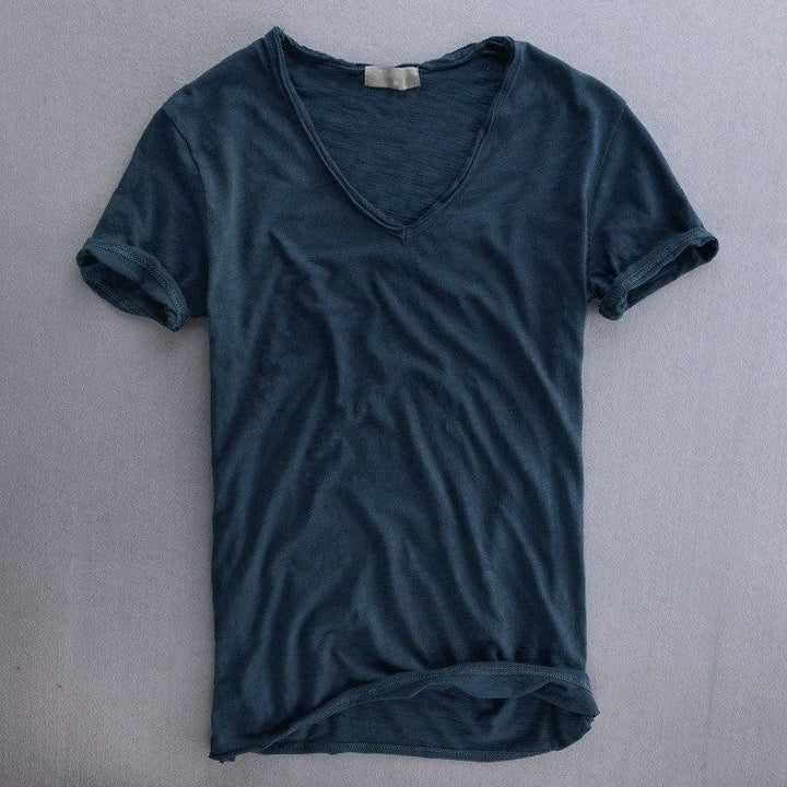 Deep navy blue V-neck T-shirt with a neat V-neckline and rolled short sleeves.