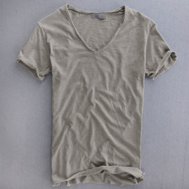Light gray V-neck T-shirt with a textured slub knit and rolled sleeve hems.