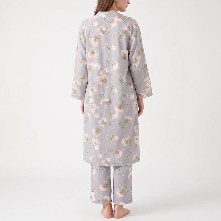Back view of the gray floral set on a barefoot model, showing the knee-length robe and cropped pants. 3