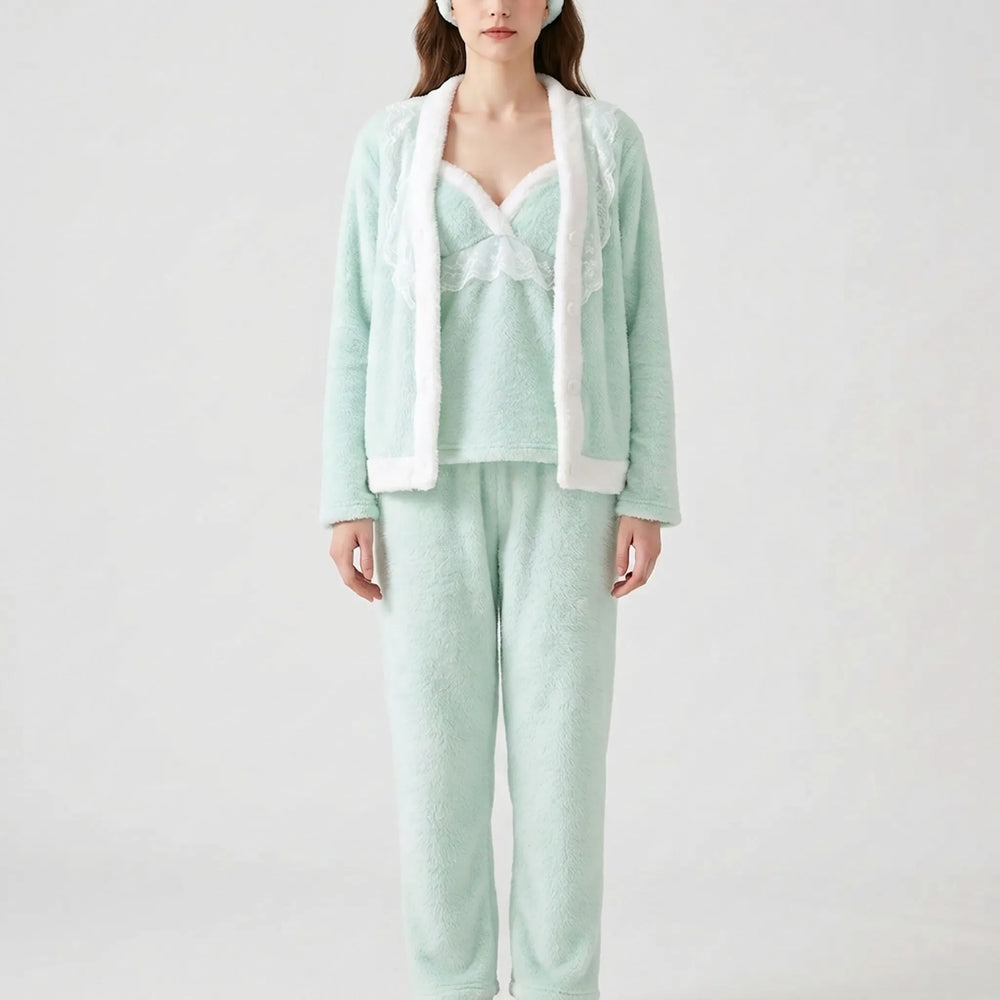 Front view of the mint fleece set with white fur trim and lace, worn with a matching fuzzy headband. 2