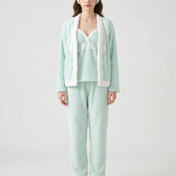 Front view of the mint fleece set with white fur trim and lace, worn with a matching fuzzy headband. 2