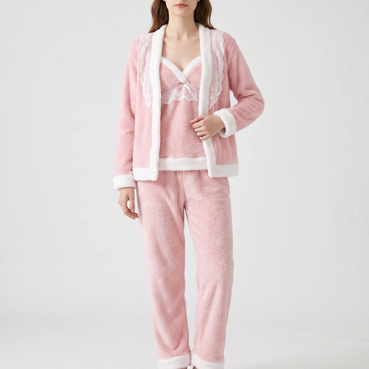 Model wearing the pink version of the set, with a small bow at the camisole neckline and white fur trim. 8