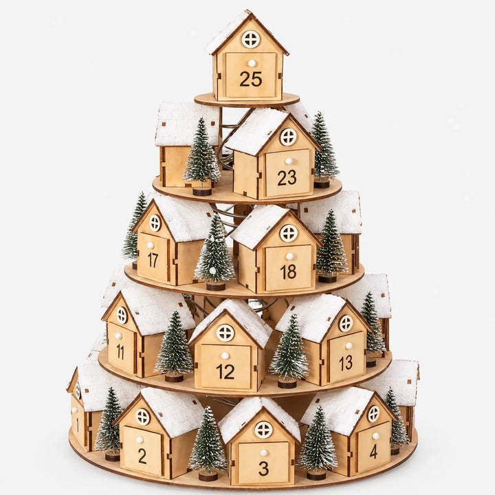Full five-tier wooden house village with small frosted trees, shown front-on against a plain white background. 2