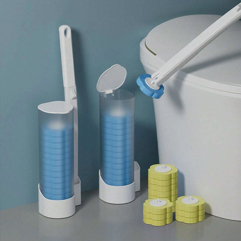 Disposable Toilet Brush with blue sponge heads and yellow replacement heads on a shelf beside a toilet.