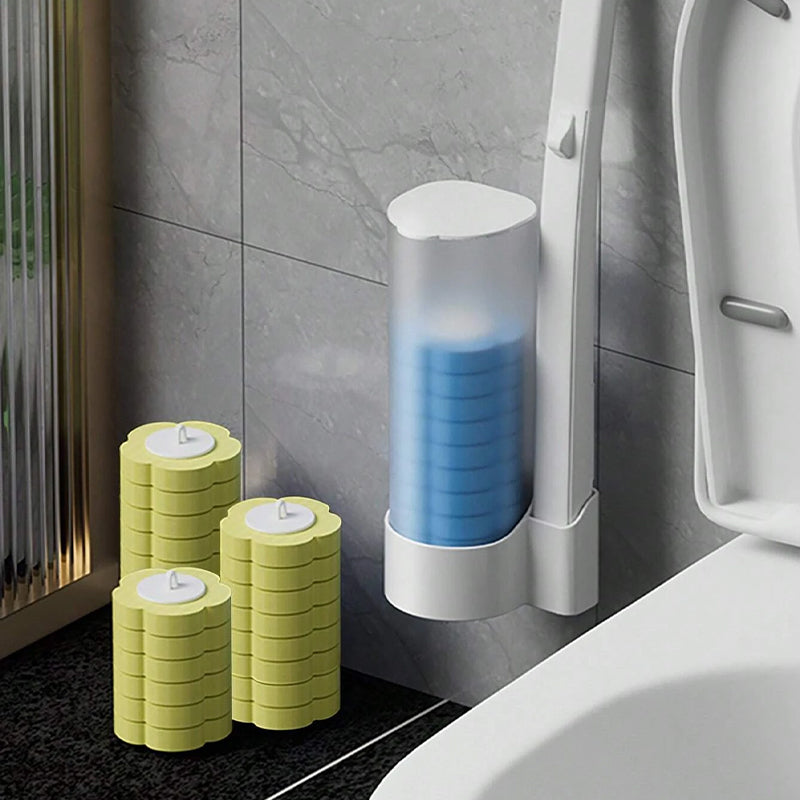 Disposable Toilet Brush detail with blue heads in a wall-mounted canister and yellow refill heads on the floor.