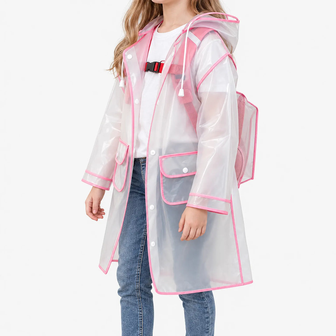 Side view of a girl wearing the pink-trimmed translucent raincoat over a backpack, showing the roomy rear panel and front flap pockets. 5