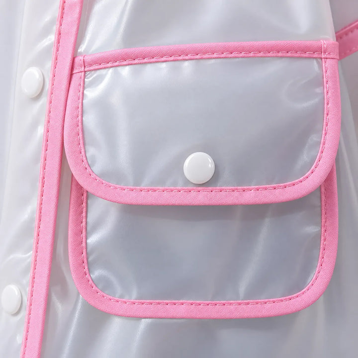 Close-up of a front flap pocket with white snap button and pink fabric binding on the translucent raincoat. 6