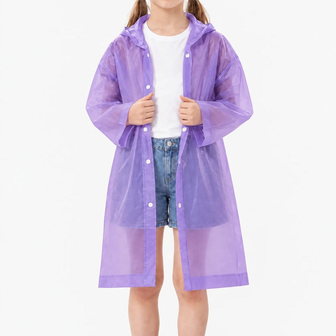 Girl in the purple translucent raincoat worn open over a white tee and denim shorts, white snap buttons along the front. 10