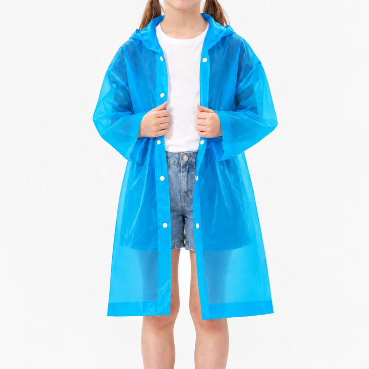 Girl in the blue translucent raincoat worn open over a white tee and denim shorts, white snap buttons along the front. 11