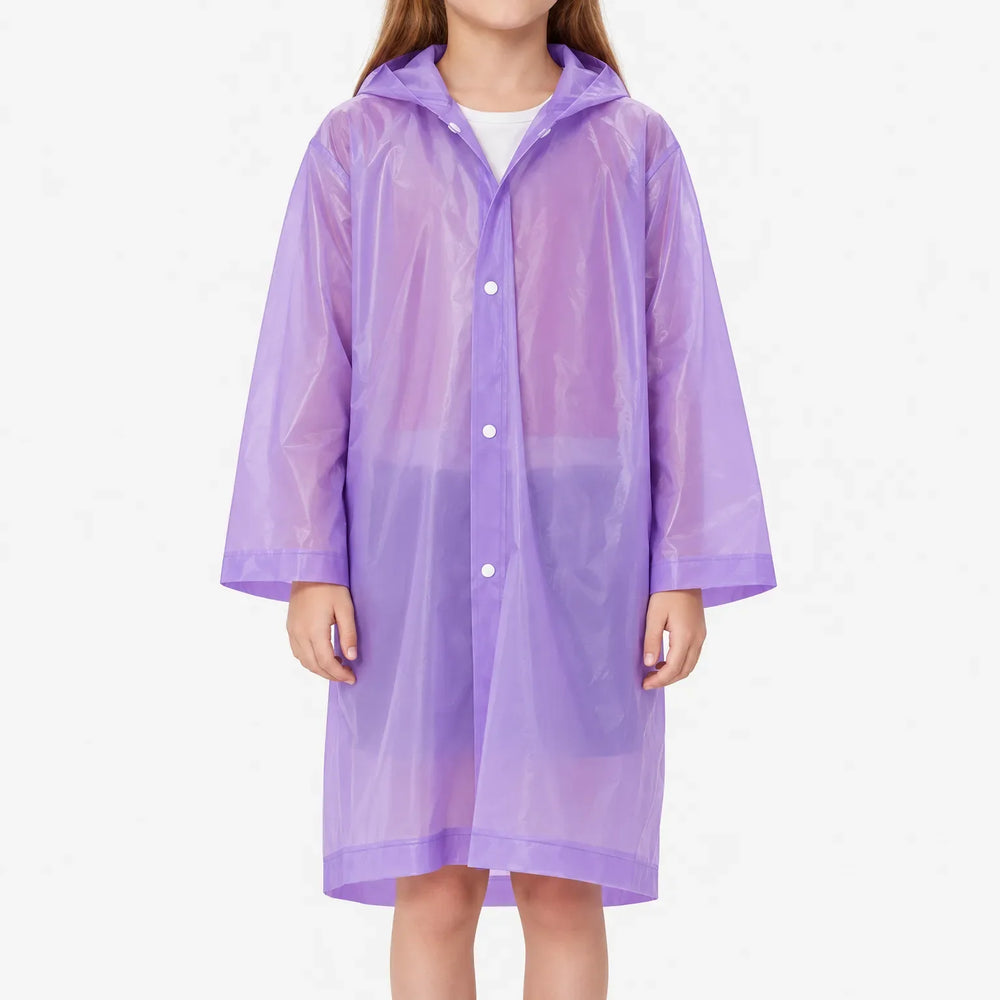 Front view of a girl in the purple translucent hooded raincoat, snap buttons closed, against a plain white background. 2