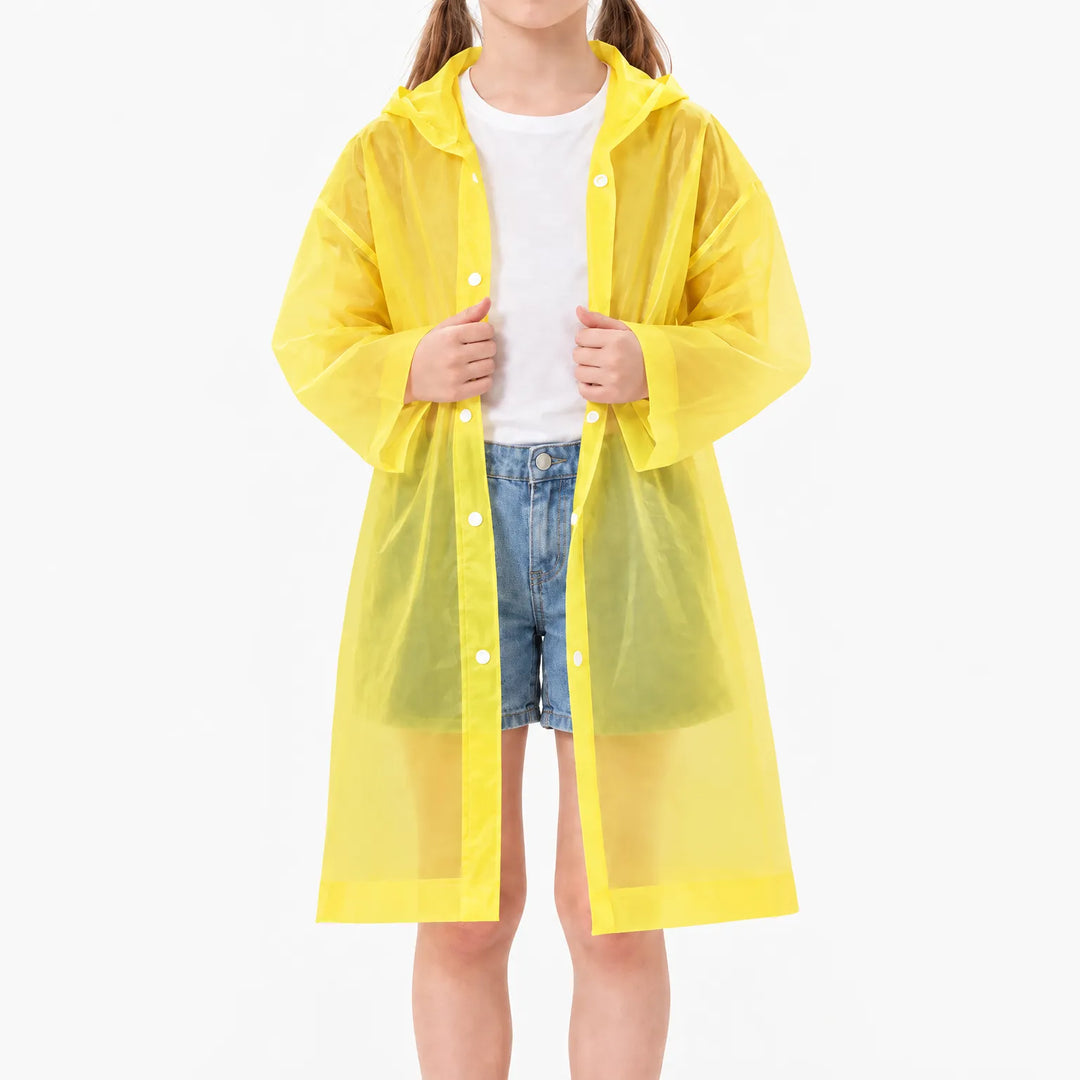 Girl in the yellow translucent raincoat worn open over a white tee and denim shorts, white snap buttons along the front. 9
