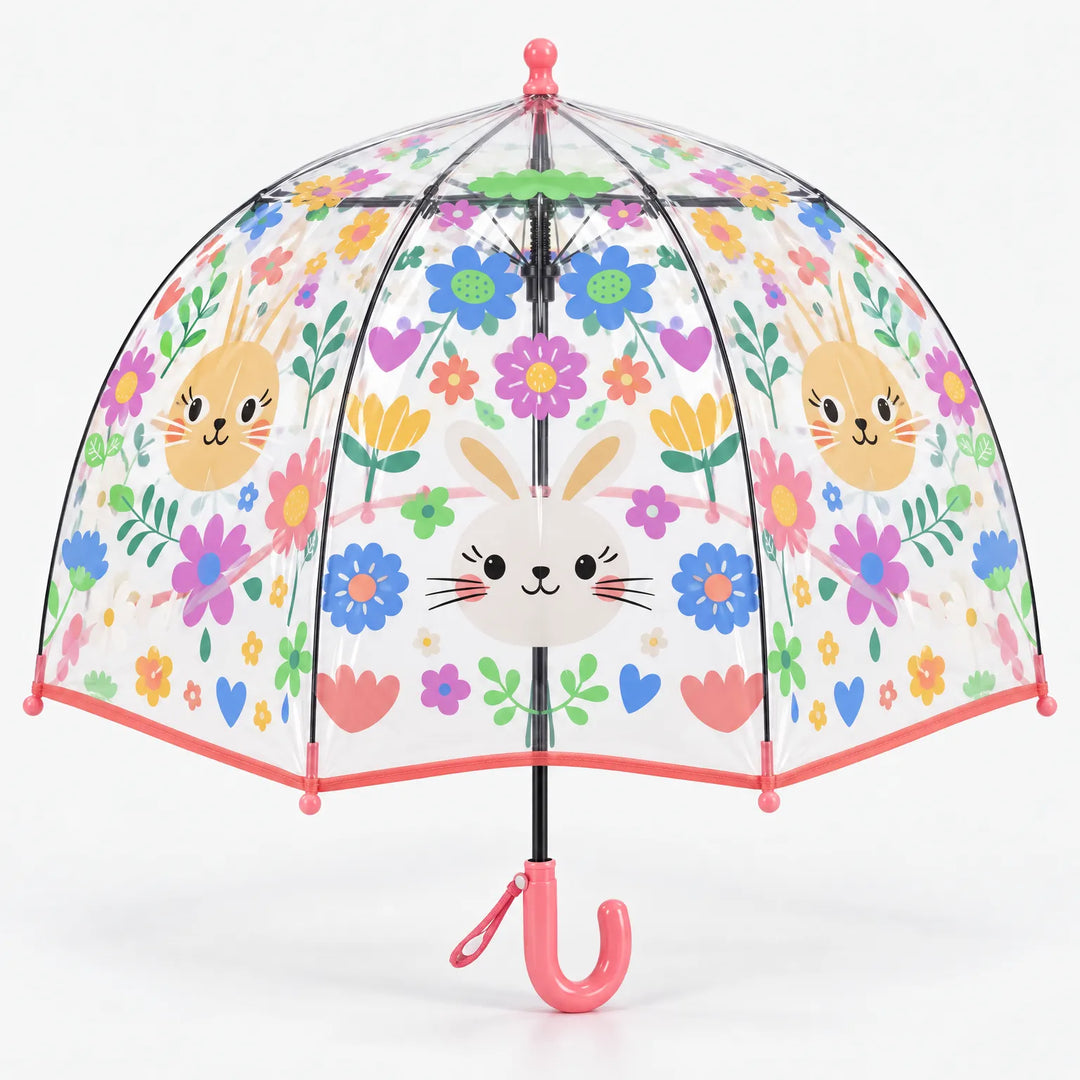 Clear dome umbrella with a coral pink trim and handle, printed with bunny faces, flowers and hearts, with a wrist loop on the handle. 12