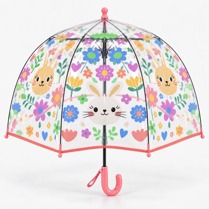 Clear dome umbrella with a coral pink trim and handle, printed with bunny faces, flowers and hearts, with a wrist loop on the handle. 12