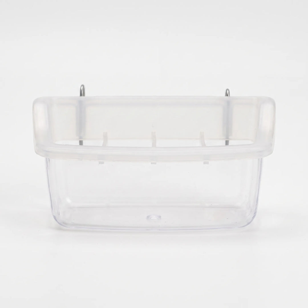 Empty small feeder from the front, showing the clear plastic bowl, frosted top rim, divider tabs and two metal hanging hooks. 6