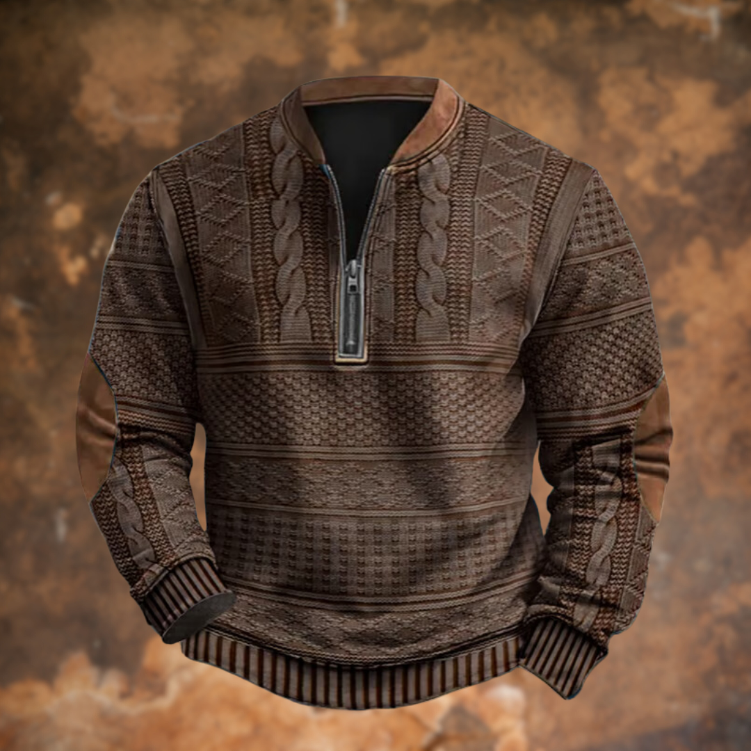 Front view in dark brown with a metal quarter zipper, cable and diamond knit texture, and tan elbow patches. 4