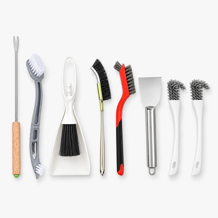 Flat lay of eight cleaning tools in a row: fork pick, dual-head brush, dustpan with brush, wire brushes, scraper and two small brushes. 1