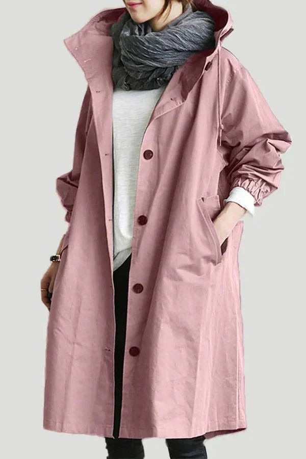 Dusty pink waterproof hooded trench coat front view with dark red buttons