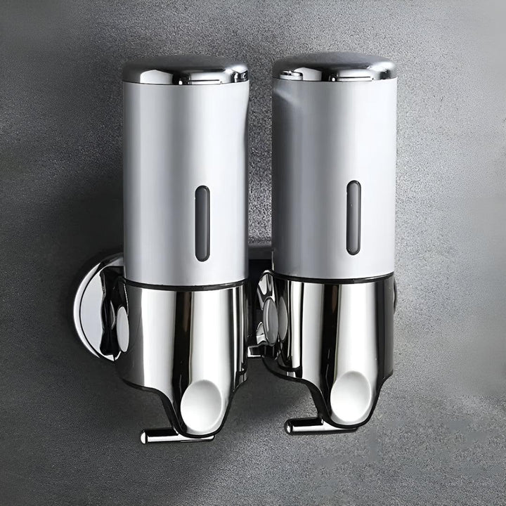 Wall-mounted white soap dispenser, another view.