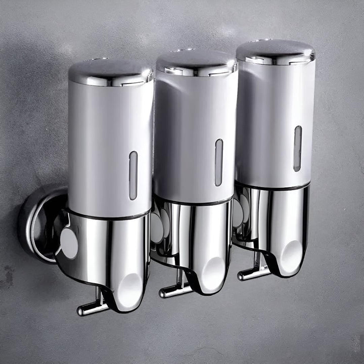 Wall-mounted white soap dispenser, another view.