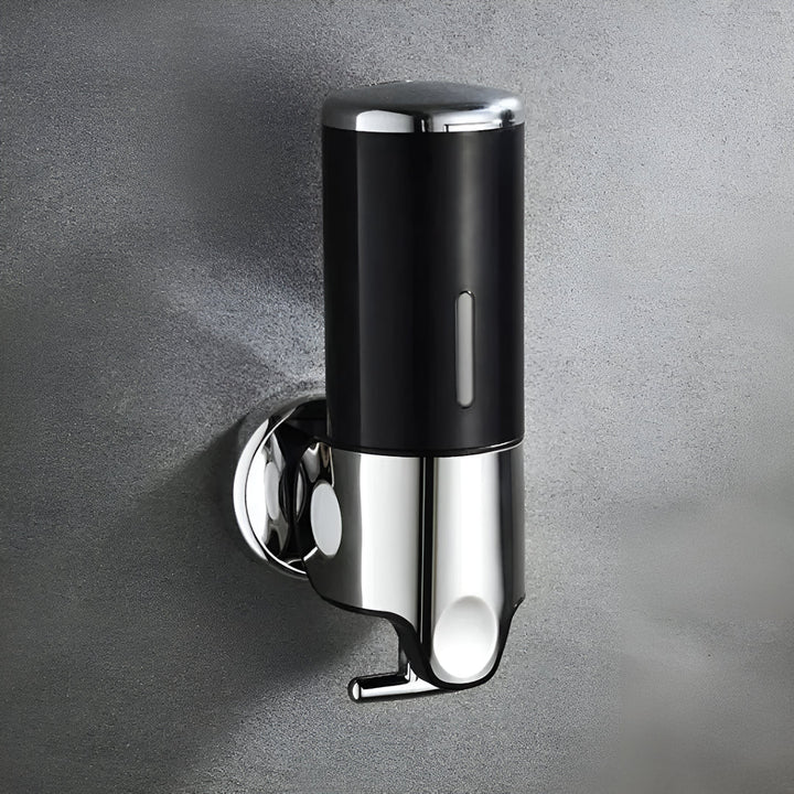 Wall-mounted white soap dispenser, detail.