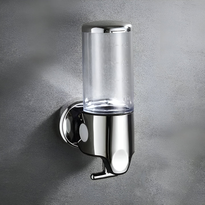 Wall-mounted white soap dispenser, detail.