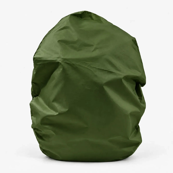 Dark green backpack cover shown alone on a white background, front view with soft creases in the fabric. 13