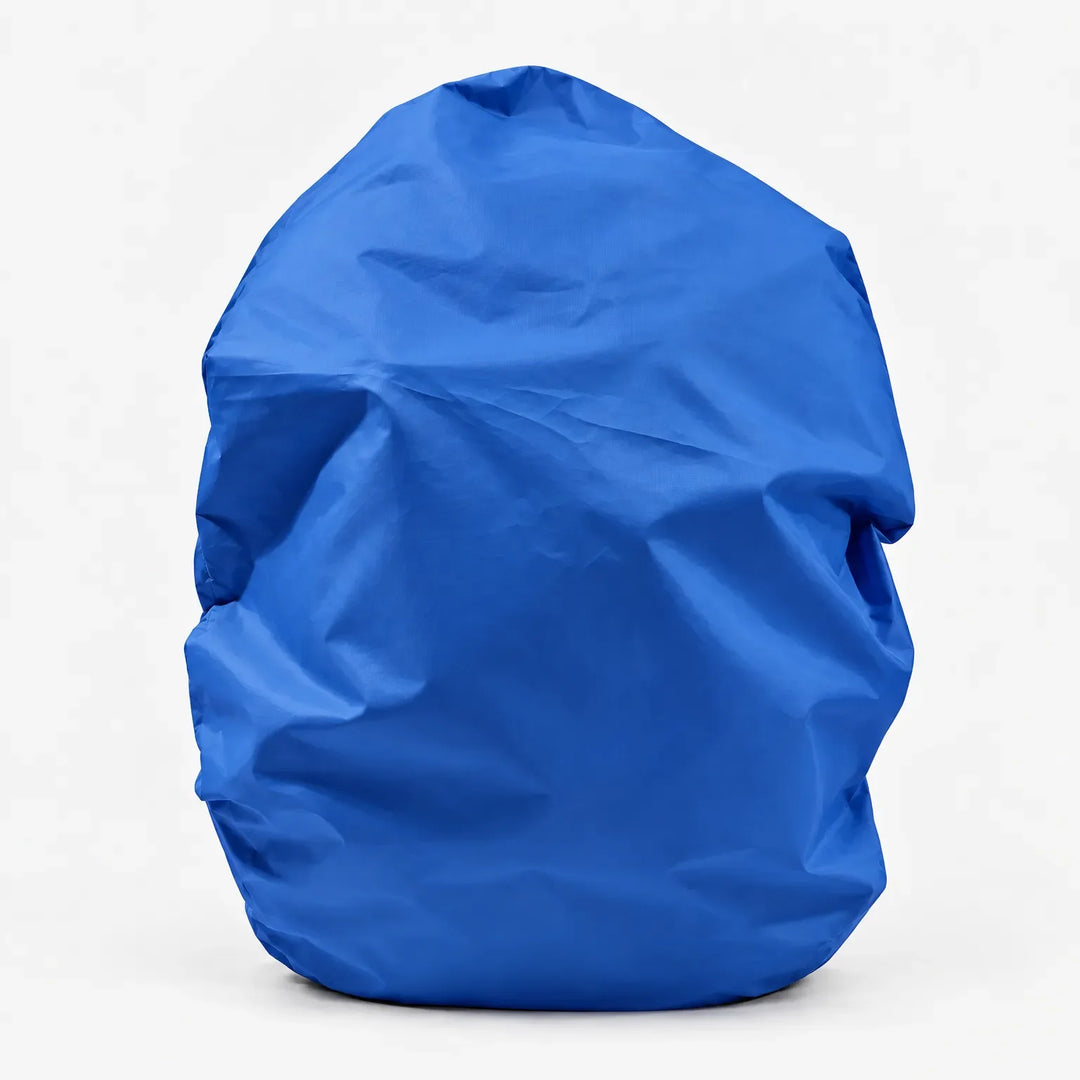 Royal blue backpack cover standing alone on a white background, front view with soft creases in the fabric. 7