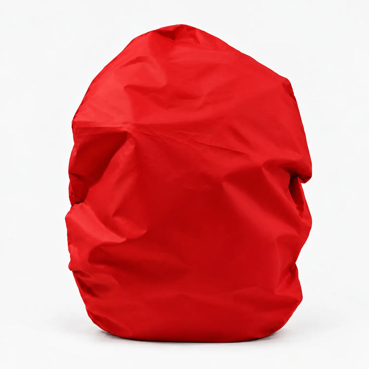 Red backpack cover shown alone on a white background, front view with soft creases in the fabric. 8