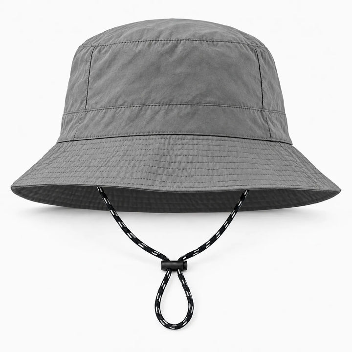 Front view of a gray bucket hat with a wrinkled matte fabric, stitched brim and a black-and-white drawcord with toggle. 10