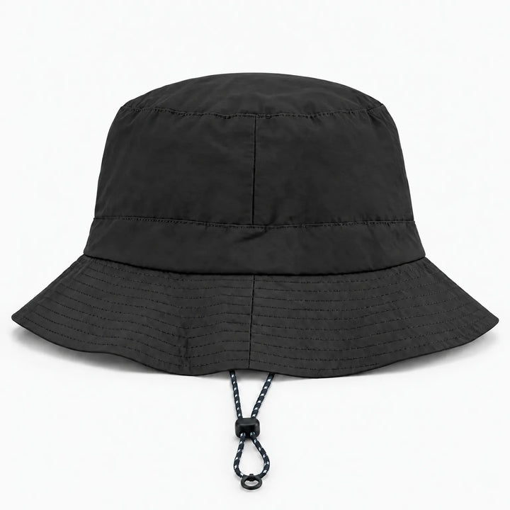 Back view of a black bucket hat with a vertical seam, stitched brim rows and a drawcord with a ring at the bottom. 11