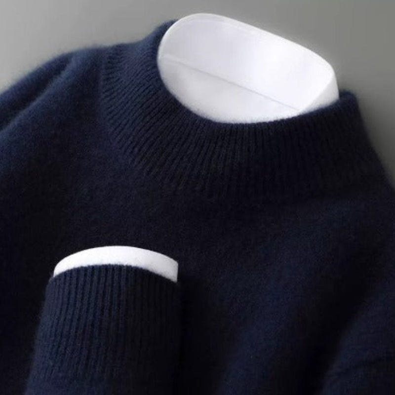 Cashmere sweater in dark navy with a ribbed mock neck, another view.