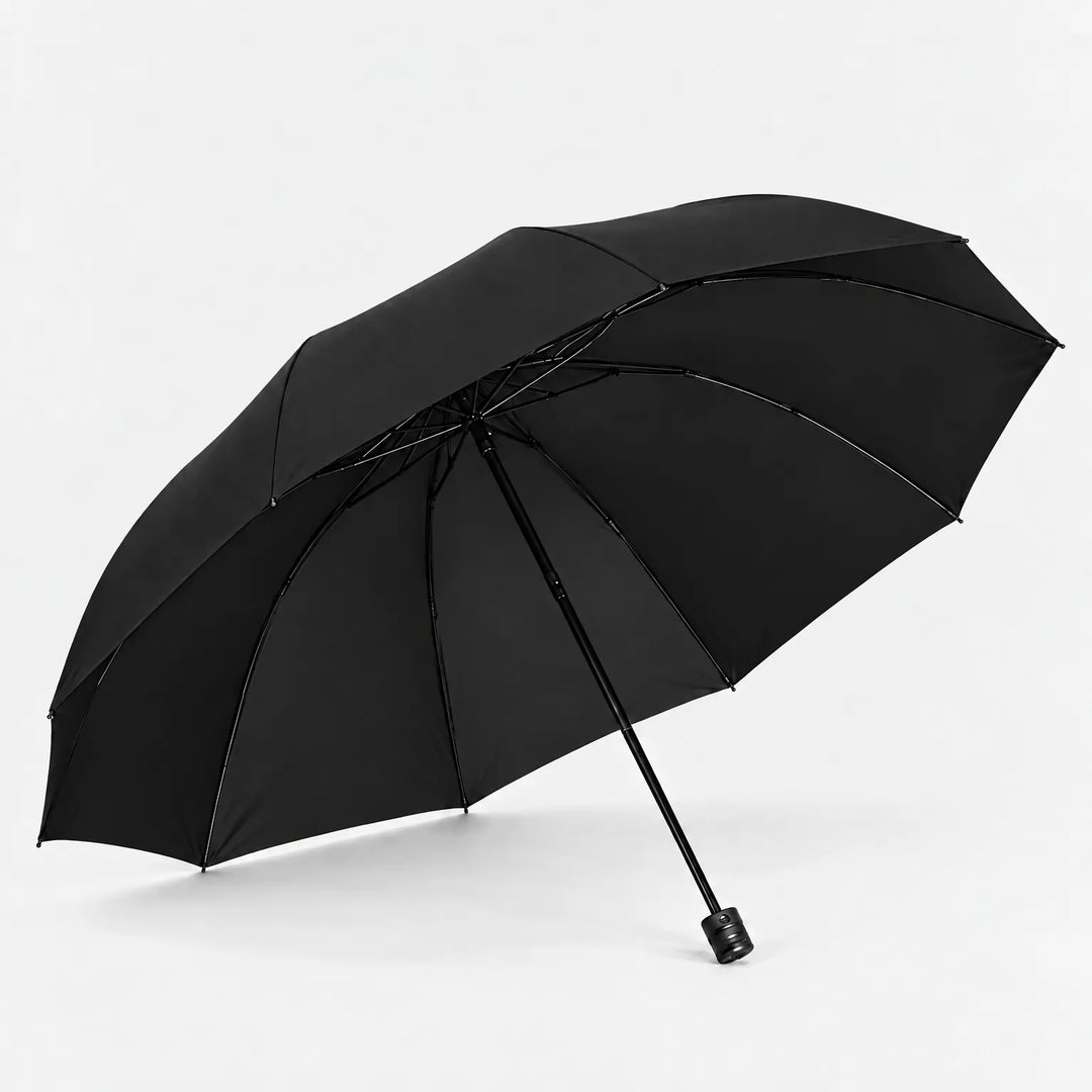 Open black umbrella tilted to display its black canopy, ribbed frame and handle against a white background. 5