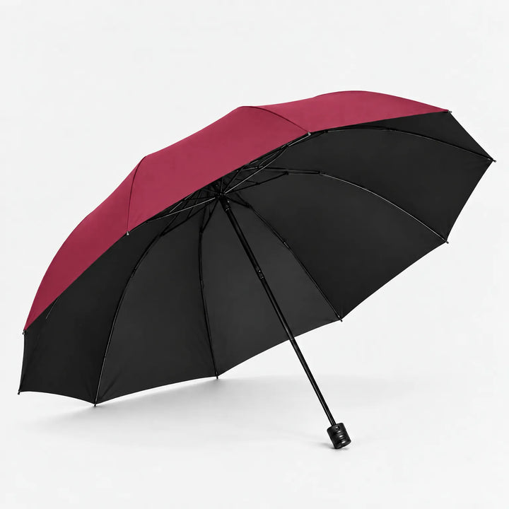 Open burgundy umbrella tilted to show its black underside, multiple ribs and black handle against a white background. 6
