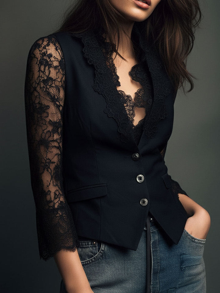 Black blazer blouse with the lace sleeve, lace lapel edge, buttons and a flap pocket, another view.