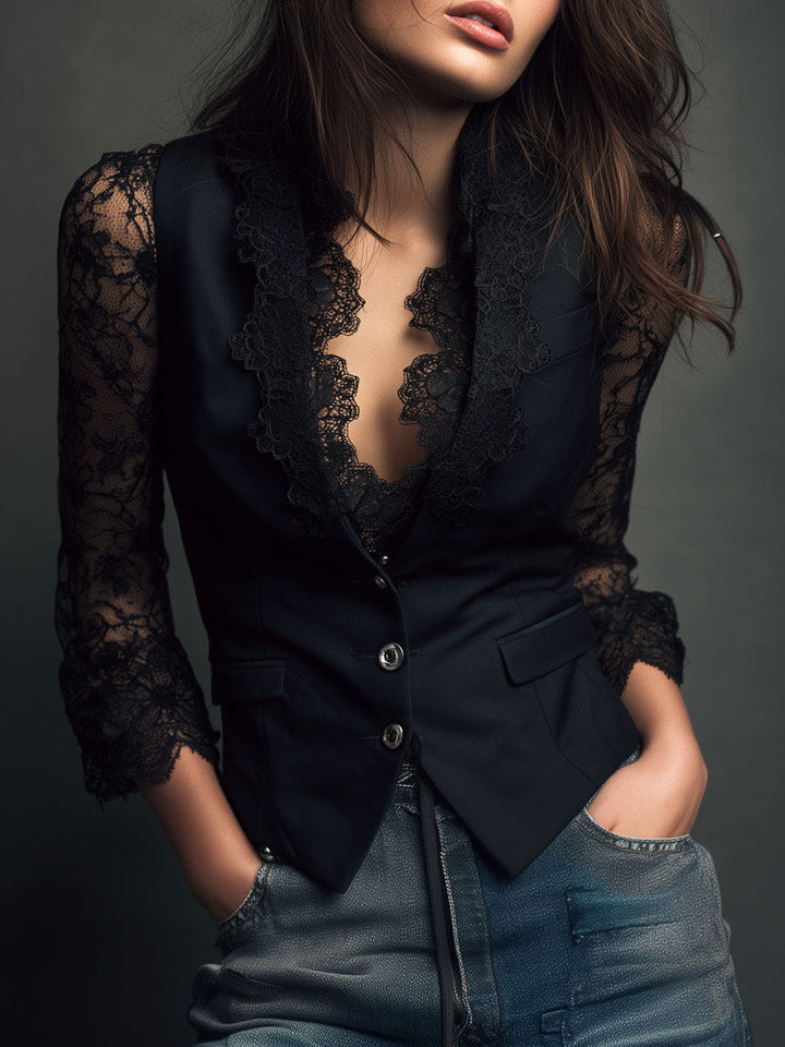 Black blazer blouse with sheer lace sleeves and lace-edged lapels, front view.