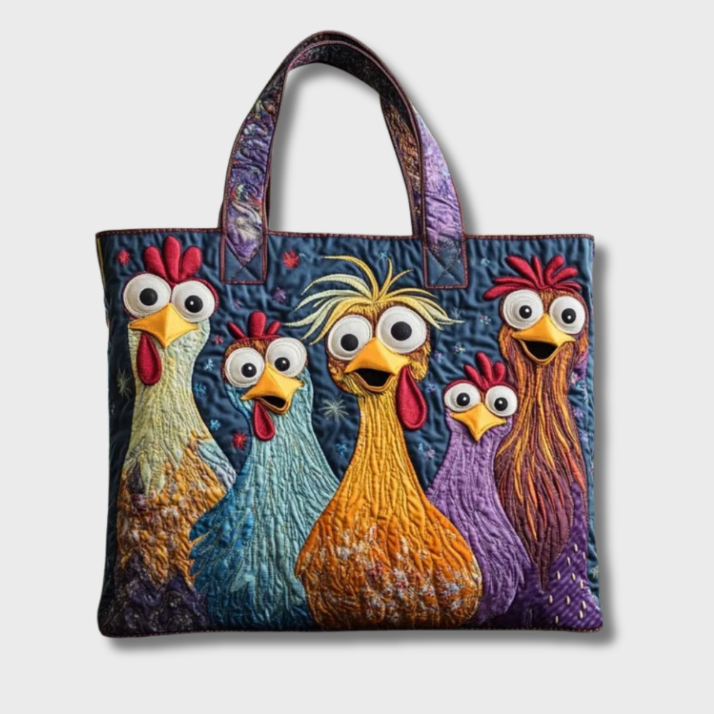 Blue quilted tote detail with five wide-eyed appliqué chickens and patterned purple handles.