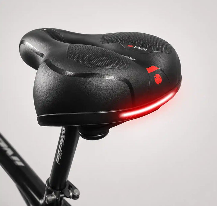 Rear angle view of the saddle on a seatpost with the red reflective strip.