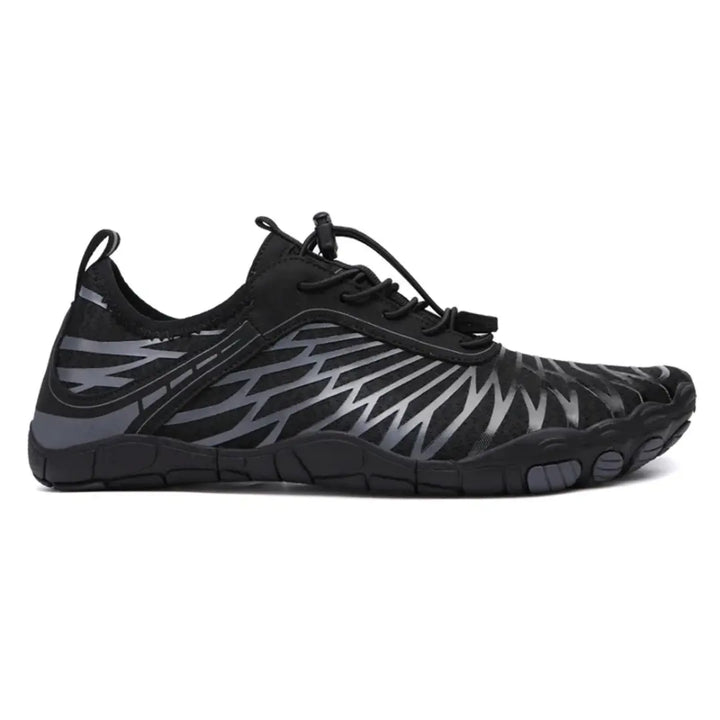 Right-side view of the black barefoot shoe showing gray overlays, toggle laces, heel pull loop and wide toe area.