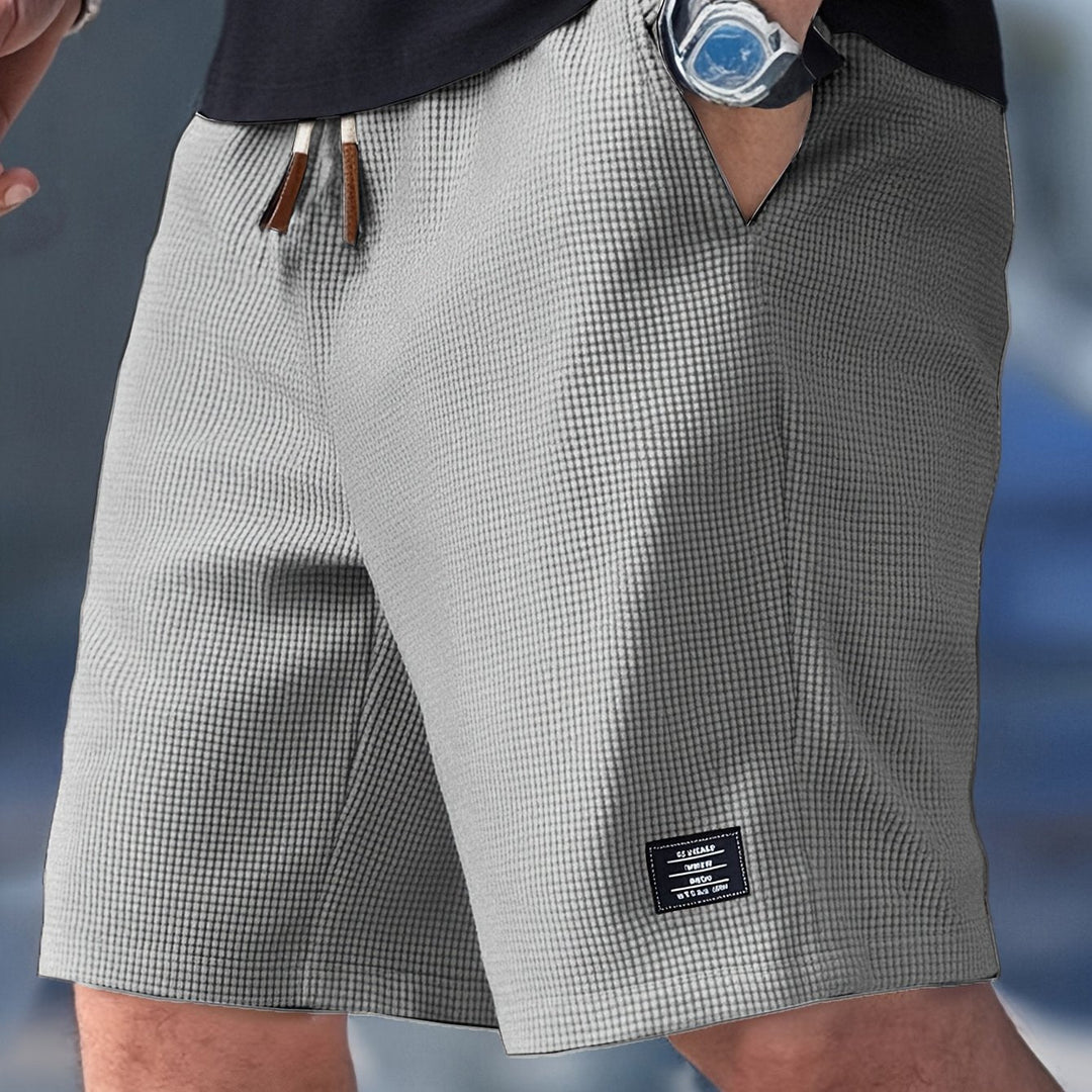 Men's green checked knit shorts with a drawstring, another view detail.