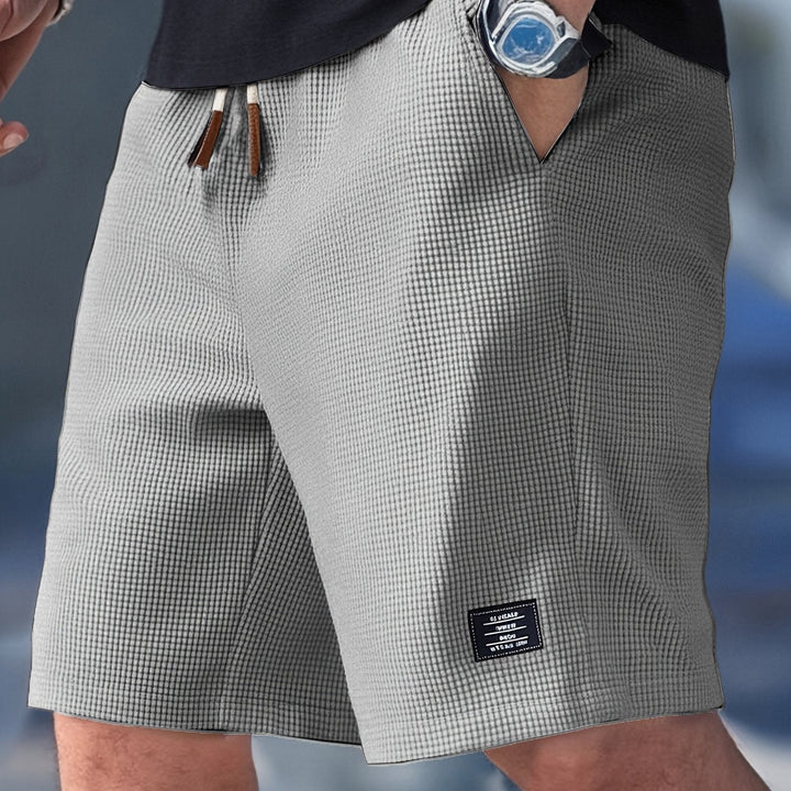 Men's green checked knit shorts with a drawstring, another view detail.