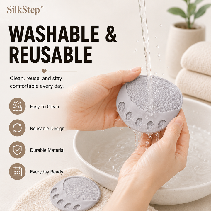 Detail of a gray forefoot cushion being rinsed under running water.