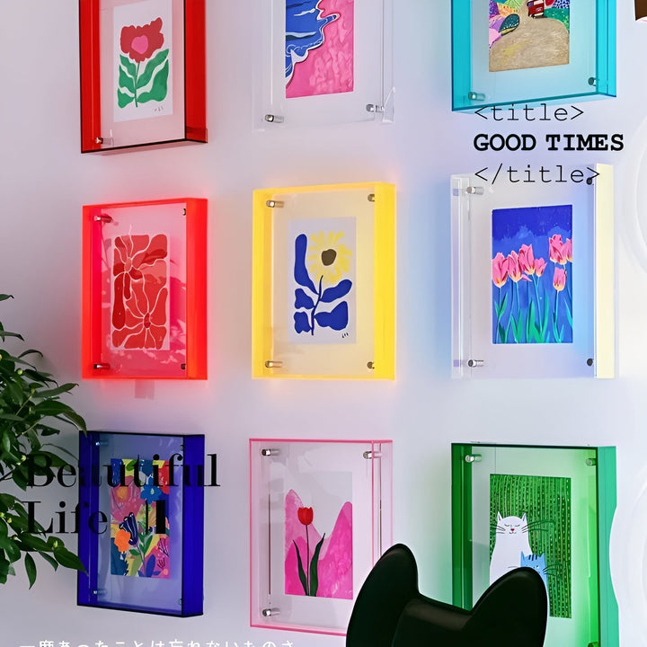 Grid of wall-mounted acrylic frames in red, yellow, blue, green and clear.