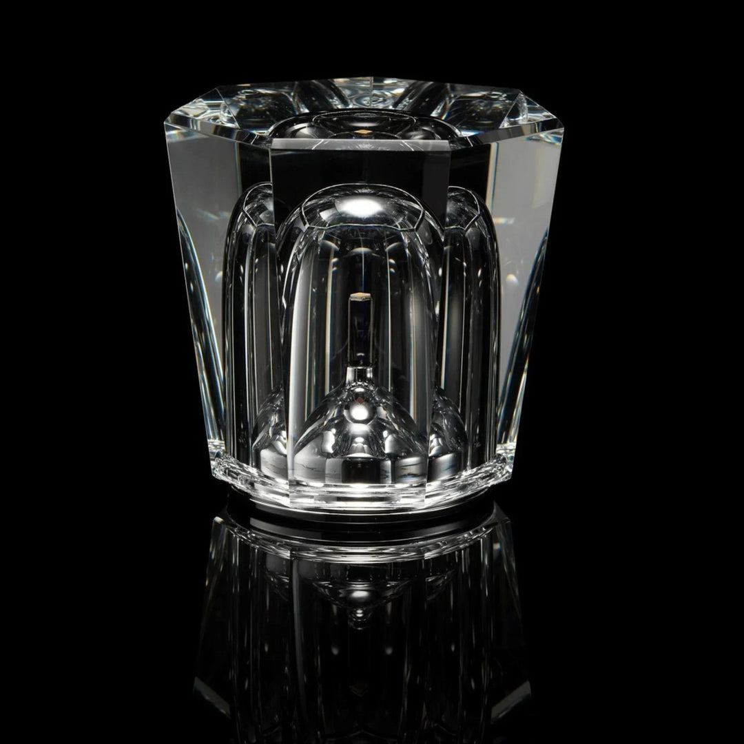 Gold transparent crystal table lamp, another view, switched off against a black background.