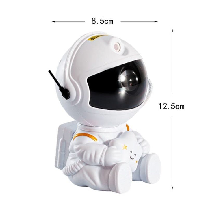 White astronaut projector in side view with dimension arrows marking its width and height, showing the backpack and hose.