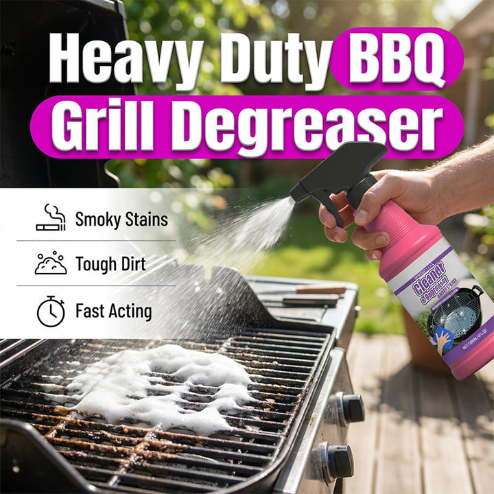 Pink trigger spray bottle on a dirty gas grill with white foam on the grates.