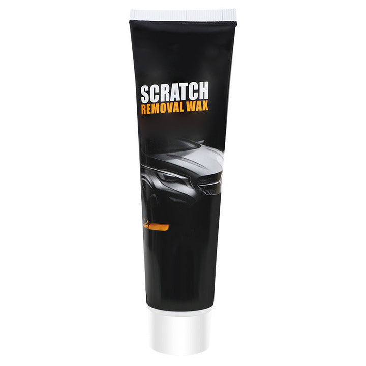 Front view of the black tube with a white cap, a dark car illustration and an orange accent, shown alone on a white background. 11