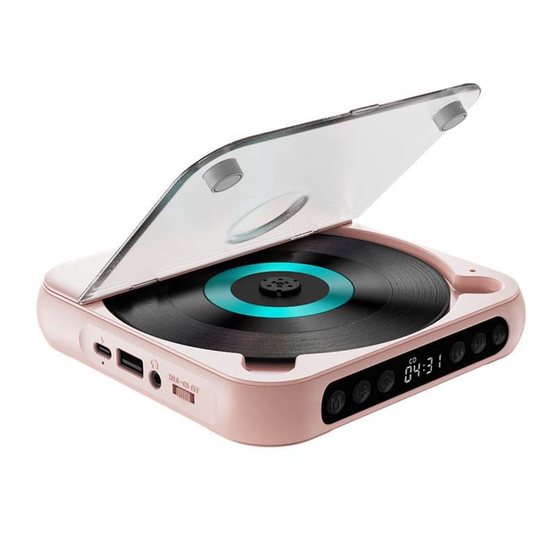 Pink player with lid open, showing a turquoise-ringed disc, side ports and front control buttons 14