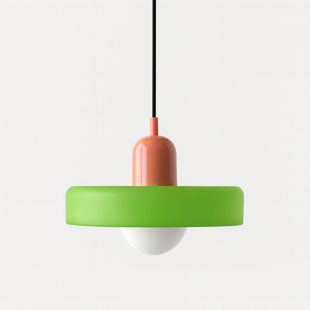 Lime green glass disc shade with a glossy coral orange capsule cap, black cord and white globe bulb. 24