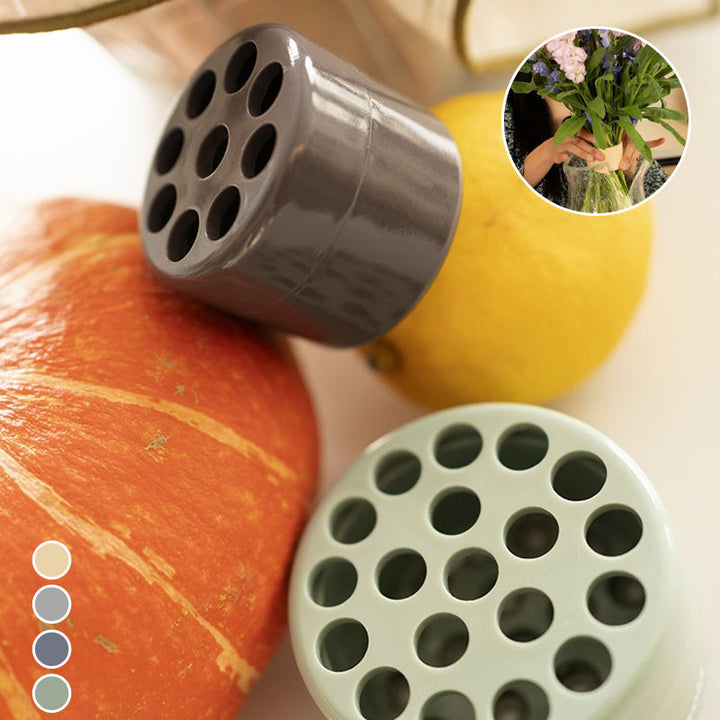 Gray 9-hole and mint green 19-hole flower arranger vase inserts with color swatches