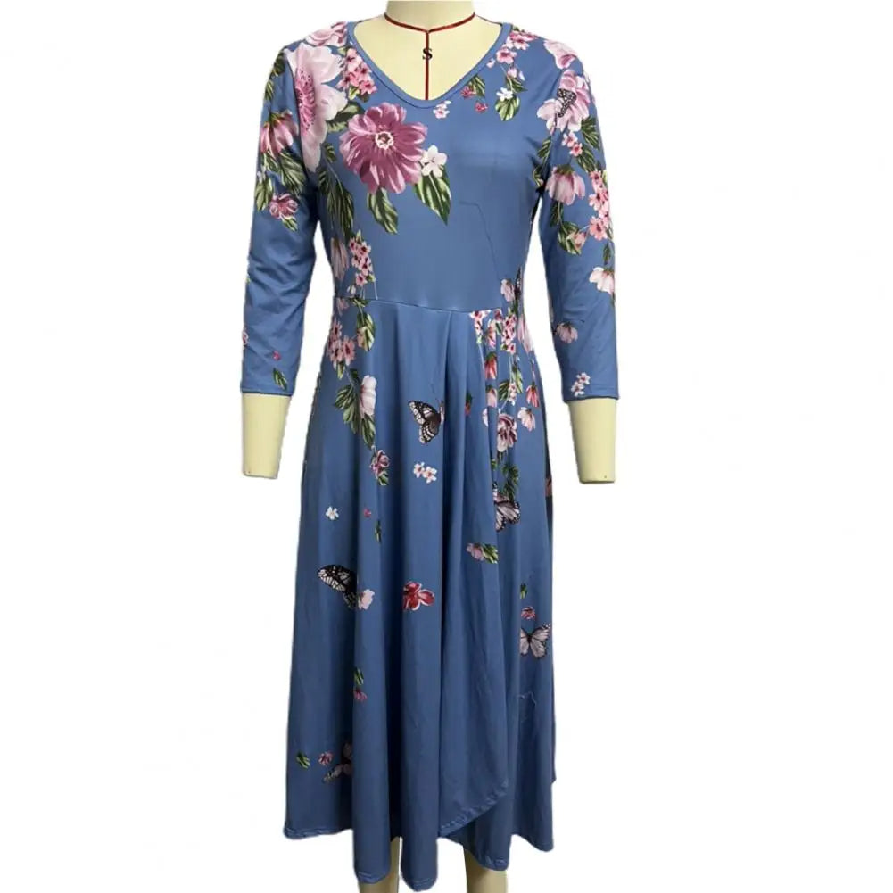 Blaues Damenkleid mit Blumenmuster, V-Ausschnitt, 3/4-Ärmel, knielang, elegant, Freizeitmode.